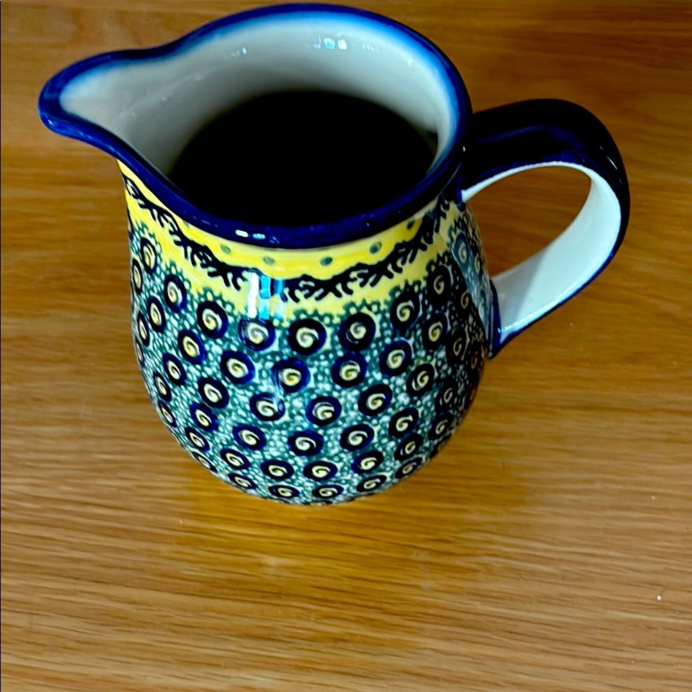 Vibrant Blue and Yellow Ceramic Jug with Intricate Patterns handmade in Poland